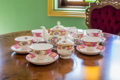 Close-up of tea cups on table