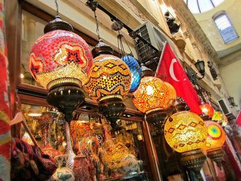 Low angle view of multi colored lanterns for sale