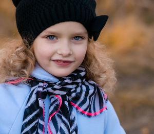 Portrait of smiling girl in snow