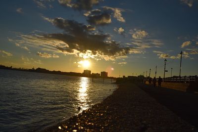 Scenic view of sunset over city