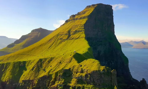Scenic view of rocks in mountains against sky