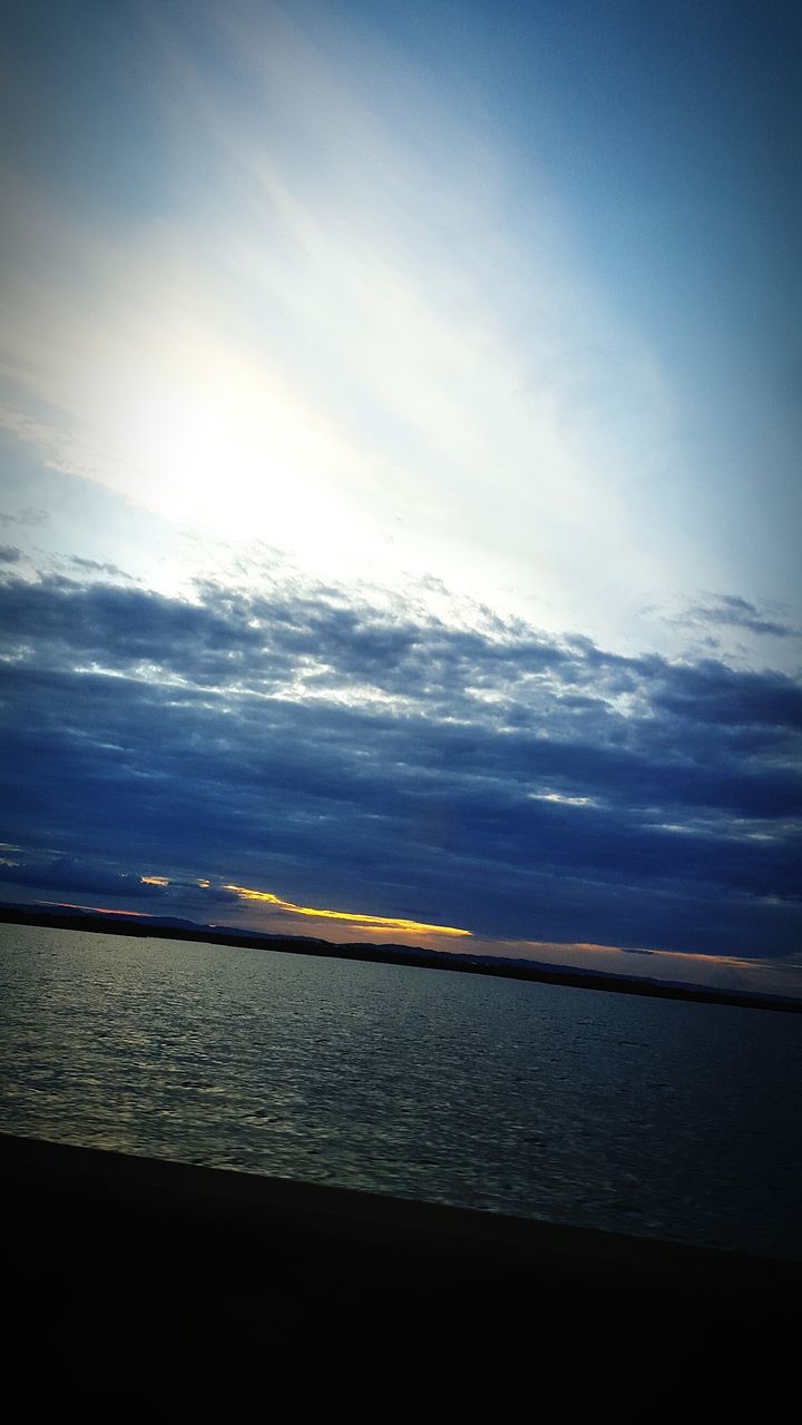 water, sky, sea, scenics, tranquil scene, tranquility, beauty in nature, horizon over water, cloud - sky, nature, idyllic, beach, cloud, blue, reflection, shore, calm, sunset, outdoors, cloudy