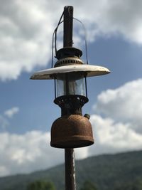 Low angle view of communications tower against sky