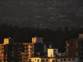 High angle view of buildings in city at night