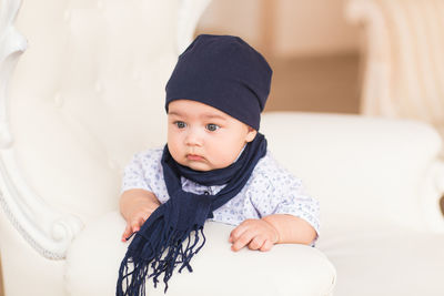 Portrait of cute baby girl at home