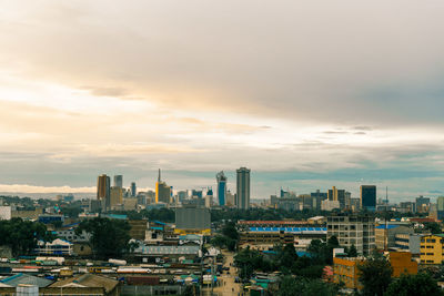 High angle view of buildings against sky during sunset