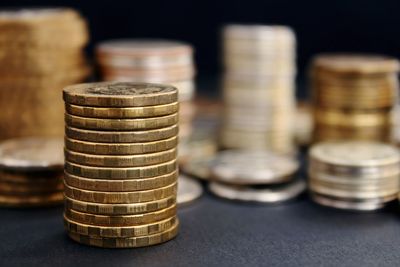 Close-up of coins on table