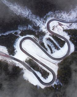 High angle view of puddle on road