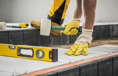 Midsection of man working at home