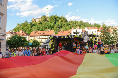 People at town square against sky