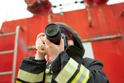 Portrait of man photographing