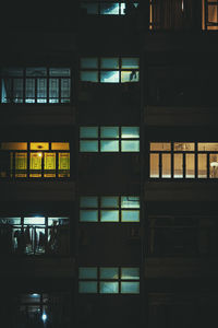 Low angle view of illuminated building at night