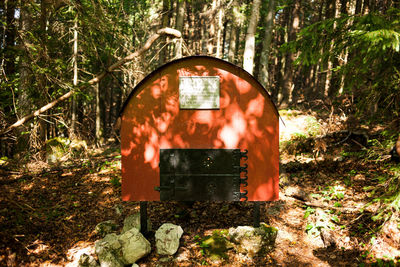 View of abandoned fire hydrant in forest