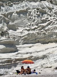 Group of people on rock