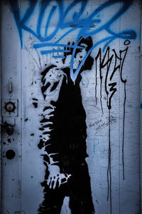 Close-up of graffiti on wall