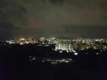 Illuminated cityscape at night