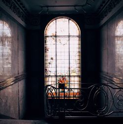 Designs on glass window of abandoned house