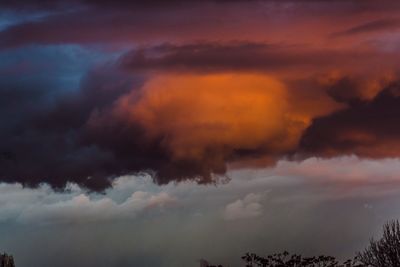 Low angle view of dramatic sky during sunset