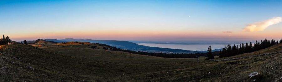 Scenic view of landscape against sky during sunset