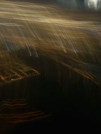 Light trails over river at night