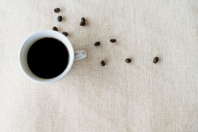 Close-up of coffee cup on table