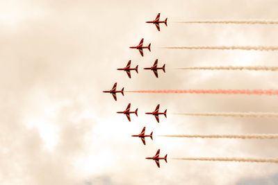 Low angle view of airplane flying in sky