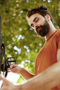 Portrait of senior man using mobile phone