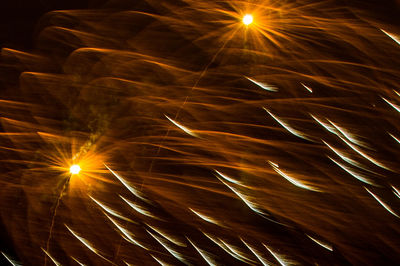 Close-up of firework display at night