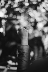 Close-up of woman hand with blurred background