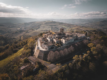 High angle view of townscape montefabbri against sky