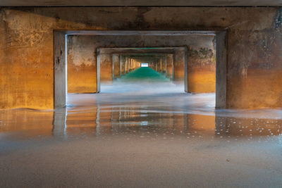 Underneath view of bridge over sea