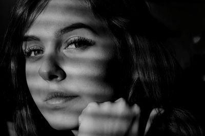 Close-up portrait of young woman