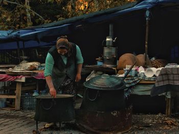 People at market stall