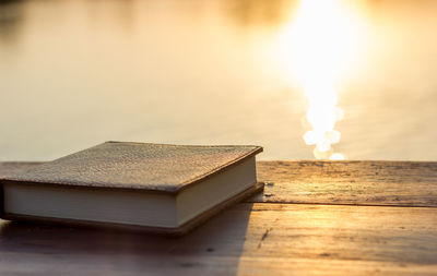 Open book on table at home