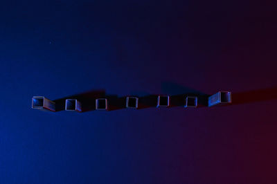 Built structure against blue sky at night