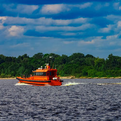 Boat on sea against sky