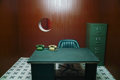 Rotary phones on table in office