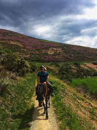 Horseback riding on the mountains in spain