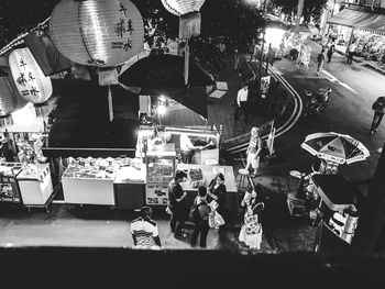 People at market stall