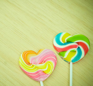 Close-up of multi colored candies on table