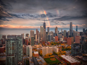 Cityscape against sky during sunset