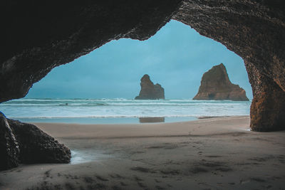 Scenic view of beach against sky