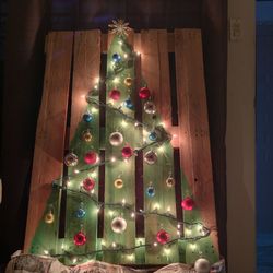 Illuminated christmas tree at night