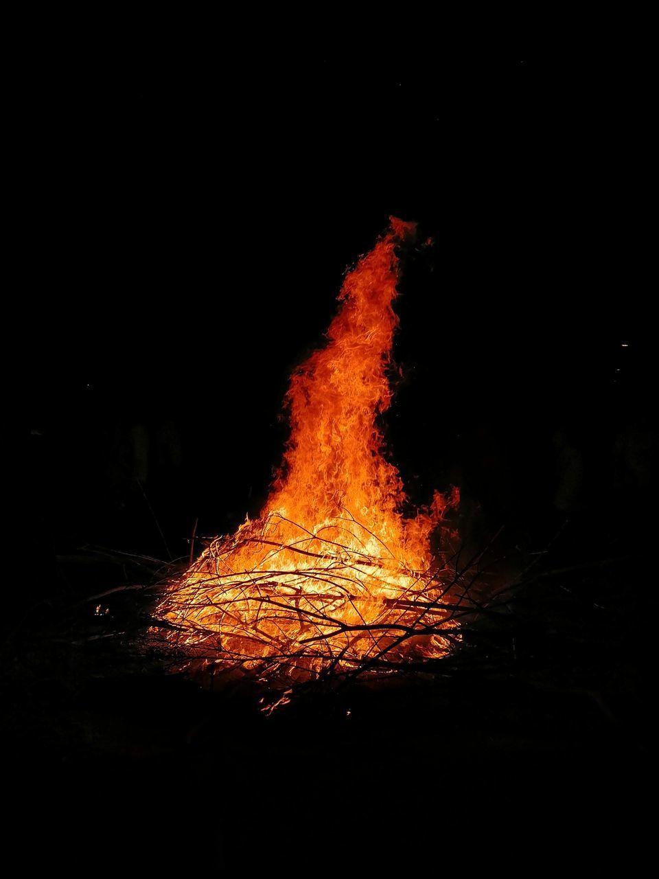 BONFIRE ON WOODEN STRUCTURE