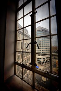 Buildings seen through glass window