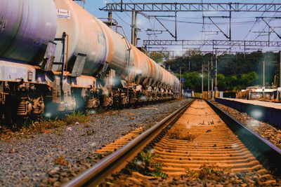 Train on railroad track against sky