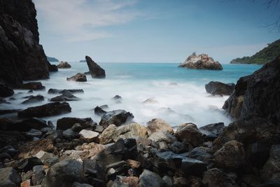 Scenic view of beach against sky