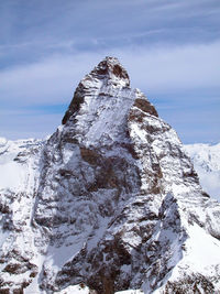Scenic view of snowcapped mountain against sky