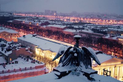 High angle view of illuminated cityscape during winter