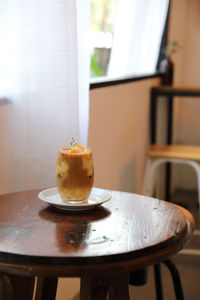 Close-up of drink on table at home